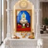 Swaminarayan Maharaj in elaborate gold and red devotional attire, framed by ornate temple pillars and flower offerings.