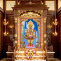 Divine figure in ornate traditional garments standing on a pink lotus pedestal, surrounded by a golden ornamental arch.