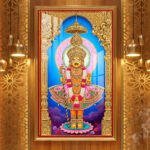 Shree Swaminarayan Bhagwan divine darshan wearing colorful traditional poshak and golden crown in an ornate golden temple.