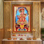 Shree Swaminarayan Bhagwan in royal red and golden poshak with beautiful ornaments and traditional temple decorations.