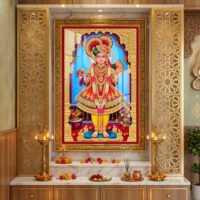 Shree Swaminarayan Bhagwan in royal red and golden poshak with beautiful ornaments and traditional temple decorations.
