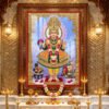 Beautiful Swaminarayan Bhagwan divine darshan wearing traditional yellow and green poshak with golden crown and flower garlands.
