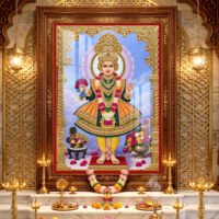 Beautiful Swaminarayan Bhagwan divine darshan wearing traditional yellow and green poshak with golden crown and flower garlands.